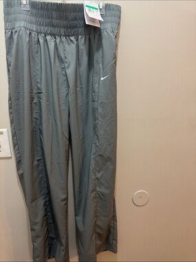 Nike Light Gray Athletic Track Pants with White Swoosh